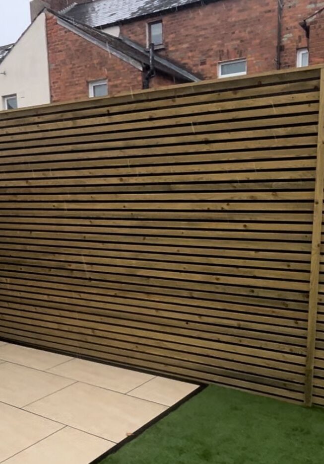 Wooden panel fencing