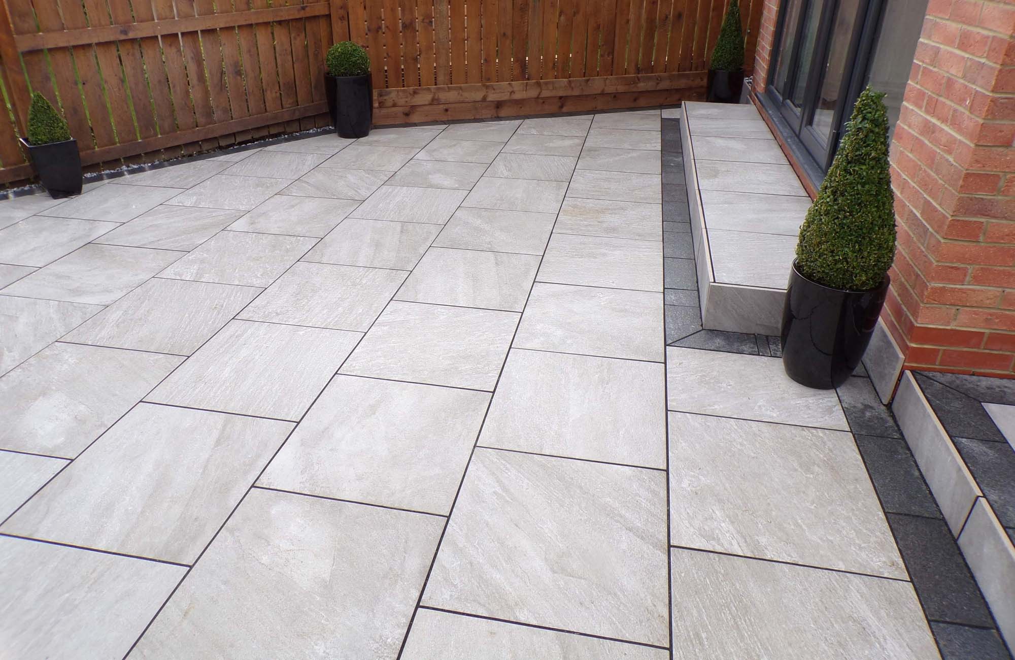Patio porcelain paving back yard steps border